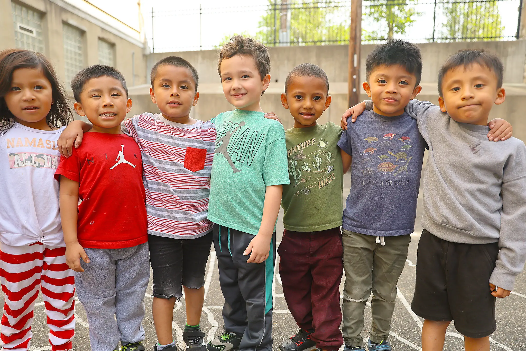 Group of elementary school children standing in line