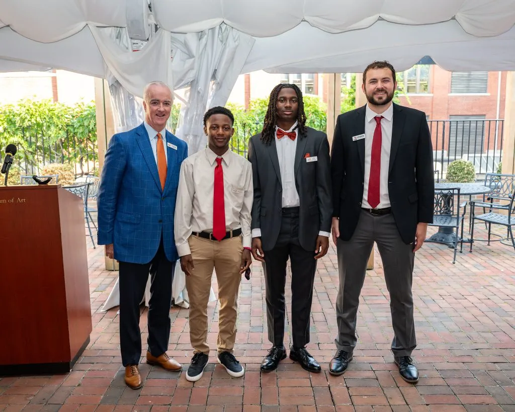 CISE Securing Their Future Campaign - scholarship receipients standing with Phil McHugh and Zach Schumucker