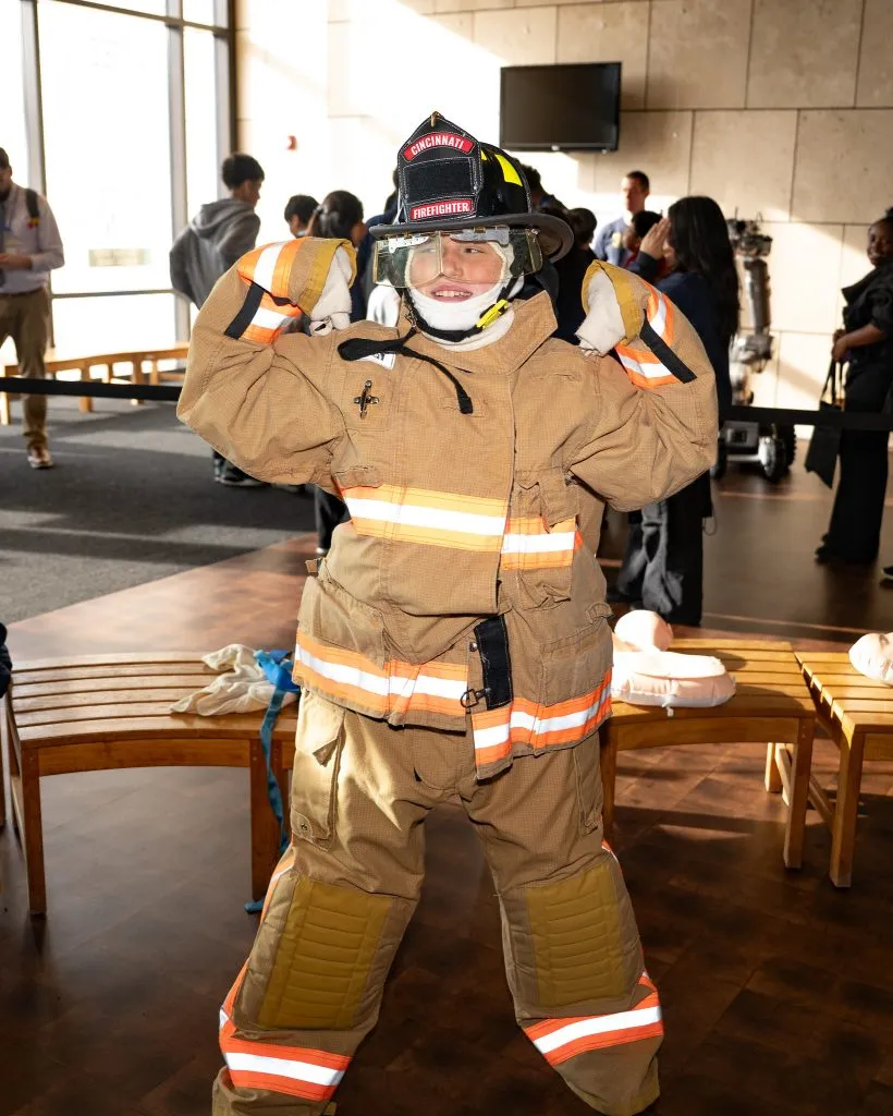 CISE Career Expo - student in fire fighter gear